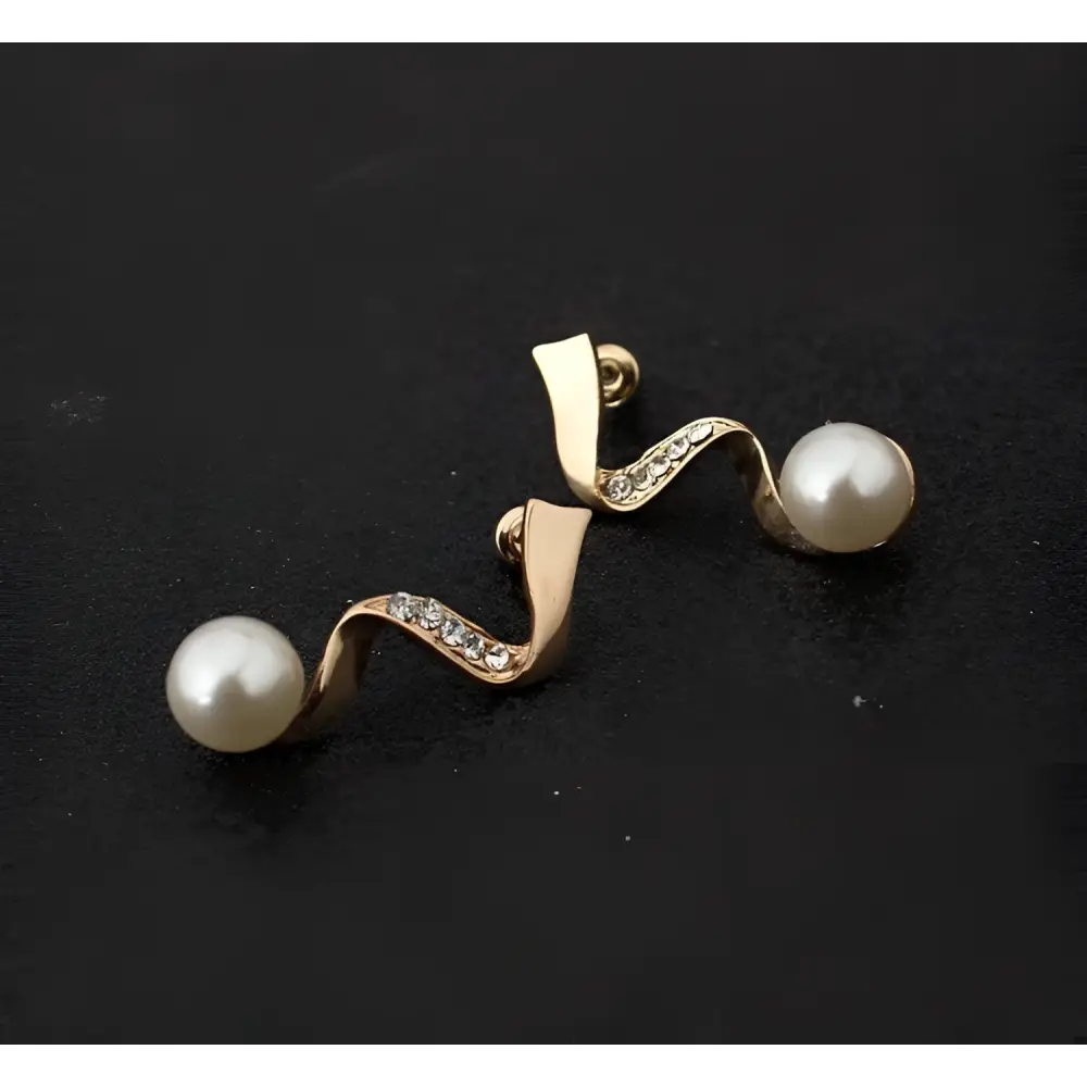 Gold-toned spiral earrings with zigzag crystal design and white pearls in a european fashion diamond crystal pearl jewelry set