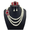 Elegant european fashion diamond gemstone pearl jewelry set with three-strand pearl necklace and red gemstone accents