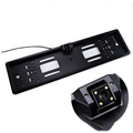 Black plastic european license plate with integrated night vision camera module shown from the back side