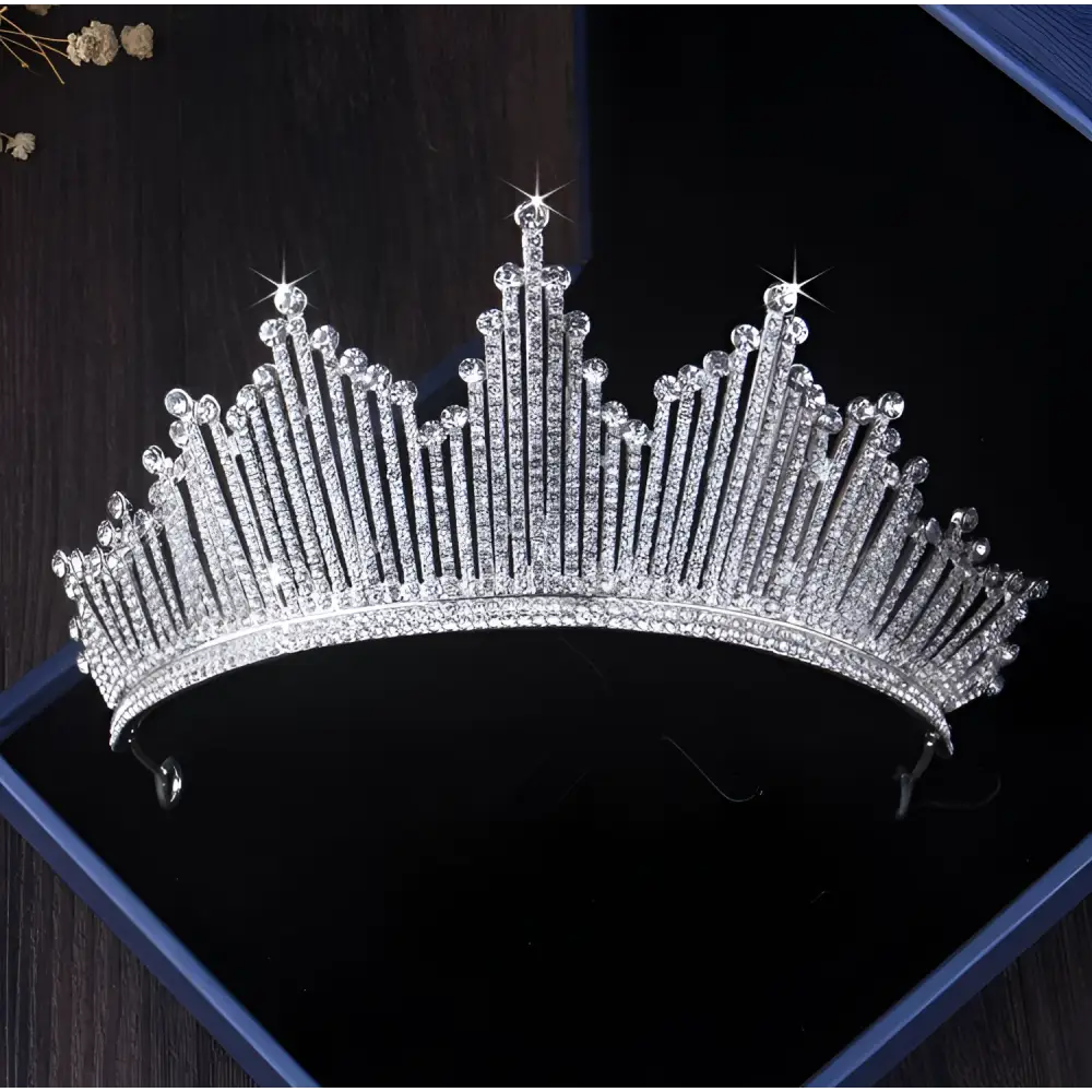 A sparkling silver European style birthday headdress crown adorned with clear crystal points in a regal design