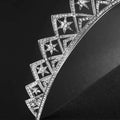 A sparkling silver european wedding xingx bridal crown star tiara with intricate star-shaped diamond motifs and geometric lattice design