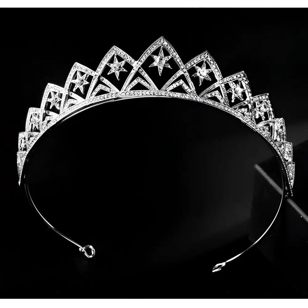 A sparkling silver european wedding xingx bridal crown tiara with intricate star cutouts and embedded crystals