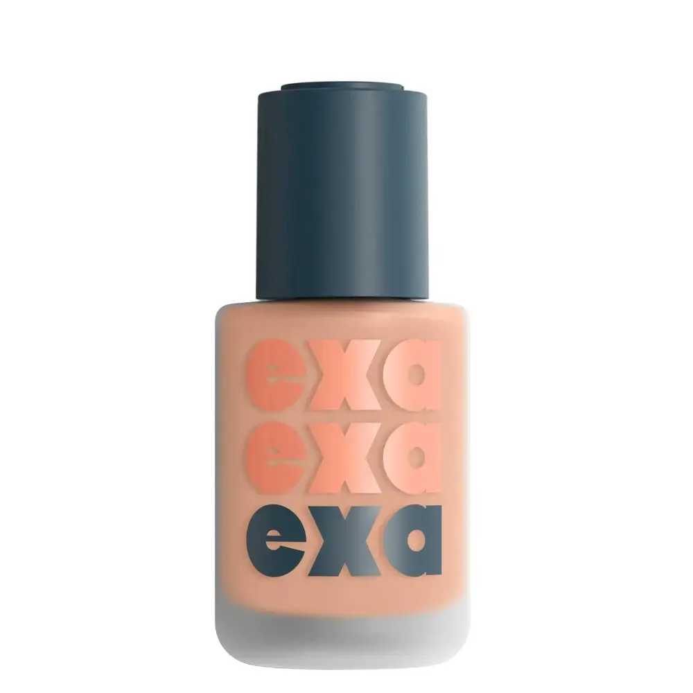 A peach-colored exa beauty natural high fidelity foundation bottle with dark teal cap and bold layered exa branding fidelity foundation lydia 400