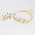 Gold-toned bracelet from exaggerated jewelry sets bridal jewelry four featuring pearl-like beads and rhinestone floral designs