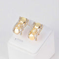 Gold clip-on earrings with two pearl stones and rhinestone floral design from exaggerated jewelry sets bridal jewelry four