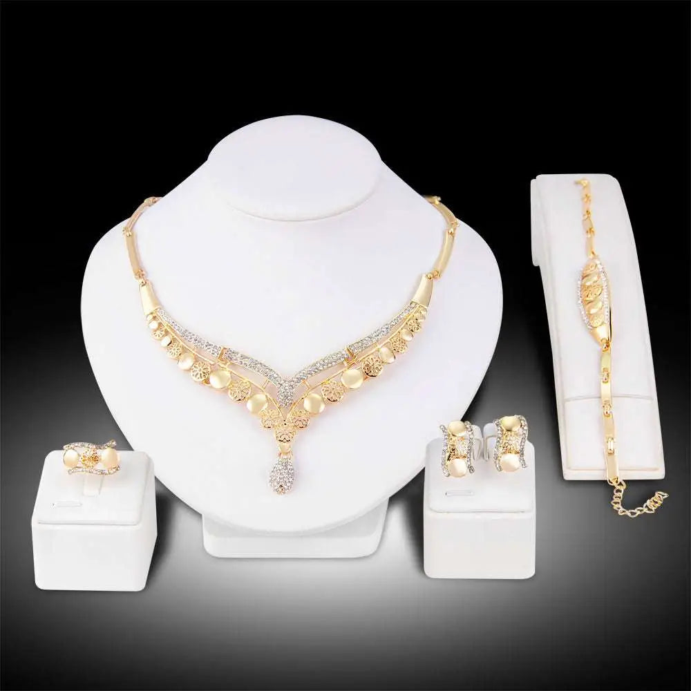 Gold-toned exaggerated jewelry sets bridal jewelry four featuring intricate filigree and teardrop crystal pendant necklace