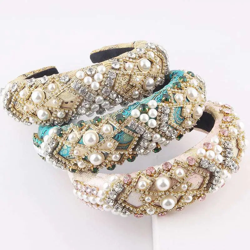 Three ornate exaggerated sponge baroque headbands with gold metalwork, rhinestones, and faux pearls in cream, teal, and blush pink