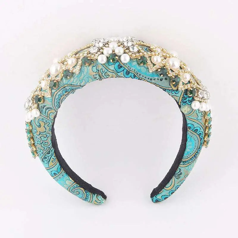 Exaggerated sponge baroque headband in turquoise and gold paisley with pearls and sparkling rhinestones detail