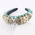 Turquoise sponge baroque headband with exaggerated sponge baroque design featuring gold metalwork pearls and crystals