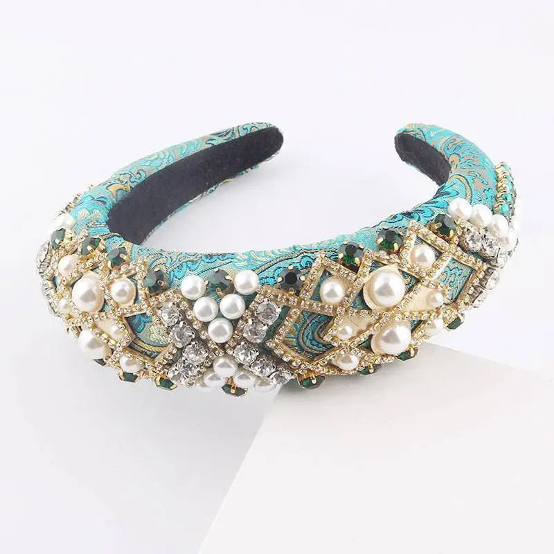 Turquoise sponge baroque headband with exaggerated sponge baroque design featuring gold metalwork pearls and crystals
