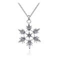 Exquisite bridal christmas snowflake necklace featuring a silver pendant with intricate crystal detailing and delicate chain