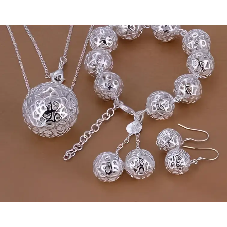 Exquisite jewelry silver filigree spherical ball pendant necklace and matching bracelet set with intricate engraved patterns