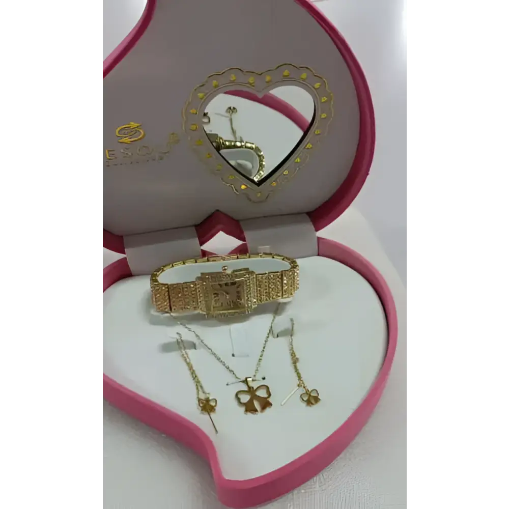 Gold diamond-encrusted exquisite jewelry watch with matching bow-shaped pendant and earrings in a heart-shaped box
