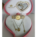 Exquisite jewelry watch with gold-toned diamond-studded bezel and bracelet in a heart-shaped watch necklace gift box