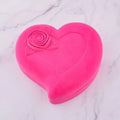 A vibrant pink heart-shaped velvet box with a raised rose detail for exquisite jewelry watch necklace gift