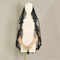 Exquisite lace black veil with pearls featuring delicate floral embroidery on sheer mesh fabric for elegant wear