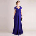 A flowing royal blue evening gown with eyelashes lace stitching japanese cotton and lace cap sleeves and fitted bodice