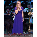 Katherine Jenkins wears a deep purple wedding gown with eyelashes lace stitching and lace cap sleeves in Japanese cotton