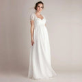 A flowing white wedding gown with delicate lace cap sleeves and eyelashes lace stitching japanese cotton fabric