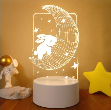 A white translucent 3d led night light with a glowing crescent moon, bunny design, and star patterns featuring colorful touch remote control lights.