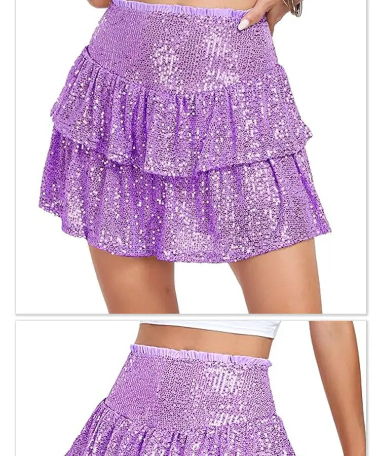 Purple sequined tiered mini skirt with elastic waistband designed as a sequin performance dance skirt.