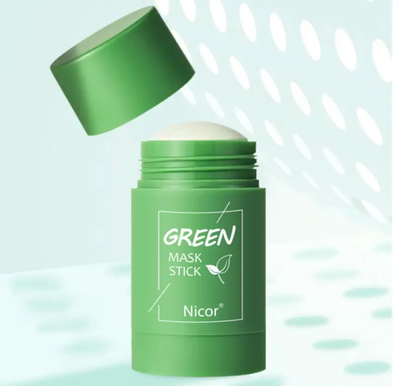 Green nicer brand cleansing green tea and eggplant oil control mask stick with a matte green cylindrical body and matching cap featuring white text labeling it as green mask stick.