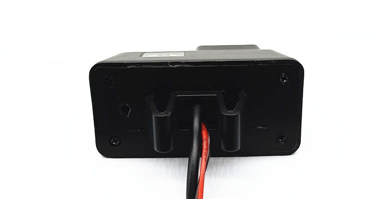 black rectangular vision reversing rear camera with molded plastic casing and two colored wires at the rear featuring four mounting screws for night vision reversing use
