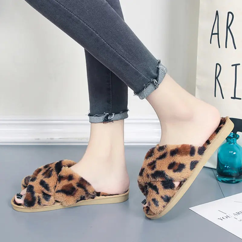 pink cross strap fuzzy slippers leopard plush house shoes featuring leopard-print fuzzy slippers leopard with a soft plush texture and tan soles