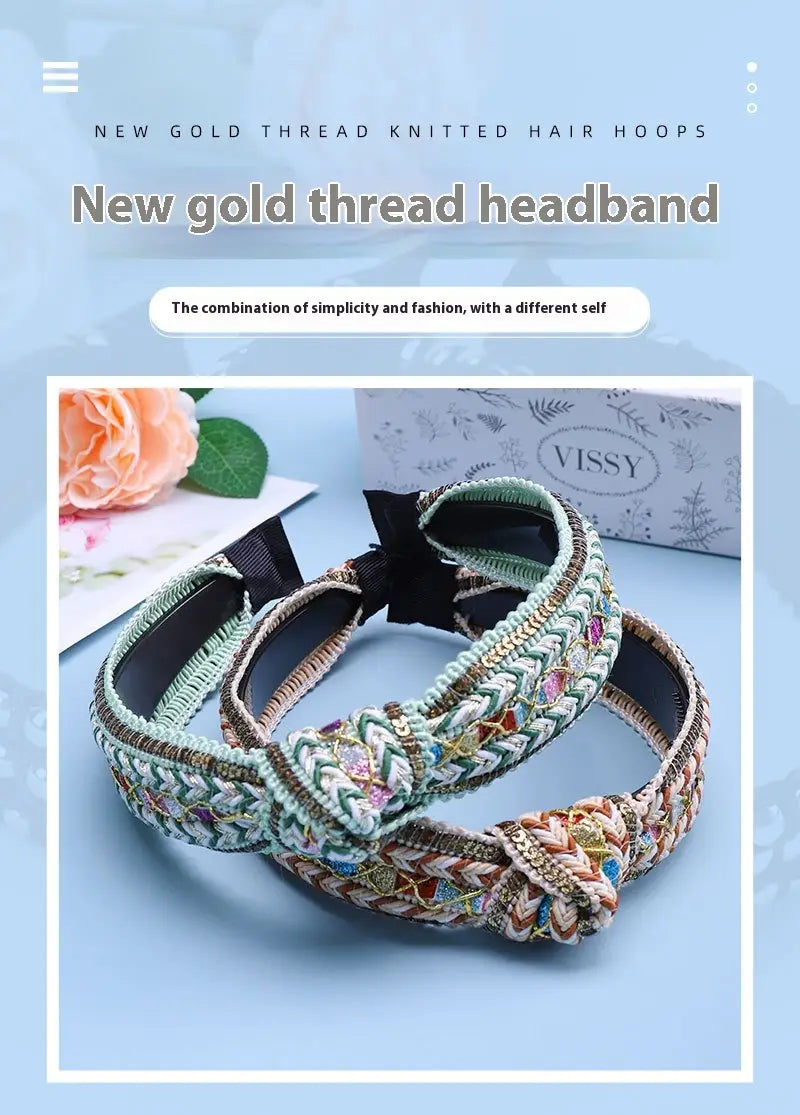 a delicate mint green knitted headband featuring intricate gold thread embroidery and a central bow as fabric knotted hair accessories bohemian style