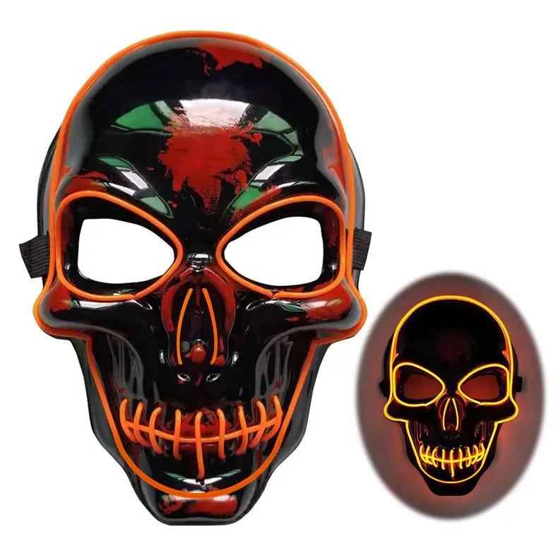Glowing black halloween skeleton mask with orange neon led lighting outlining the eyes nose and teeth for mask led glow use.