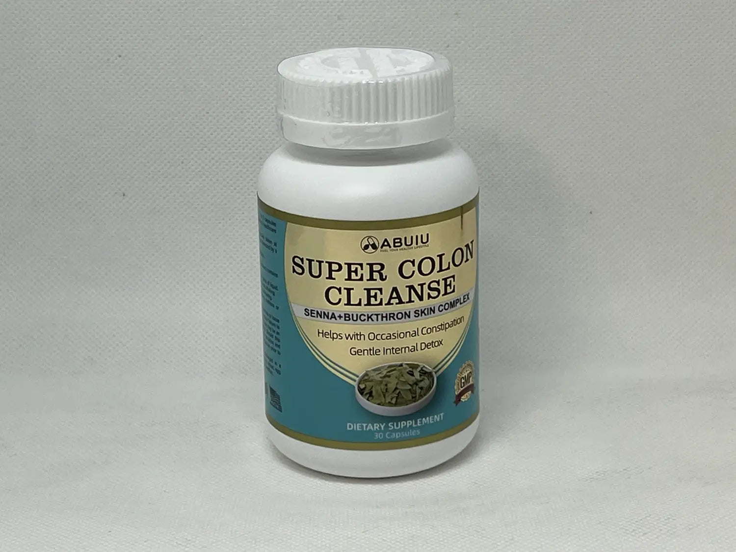 white plastic bottle of abuiu super colon cleanse dietary supplement with teal and gold label containing 30 cleanse capsules designed for digestive health.