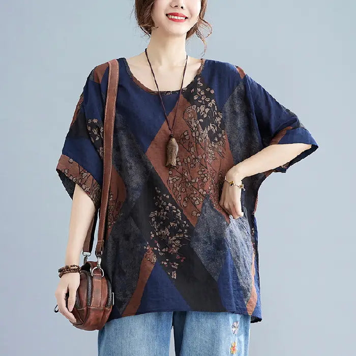stylish loose round neck printed patchwork blouse in navy blue and brown with floral embroidery details and a comfortable fit