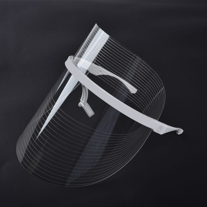 clear plastic face shield with white adjustable headband and integrated ear loops designed for multifunctional facial massager and lifting tool massagers in facial beauty applications
