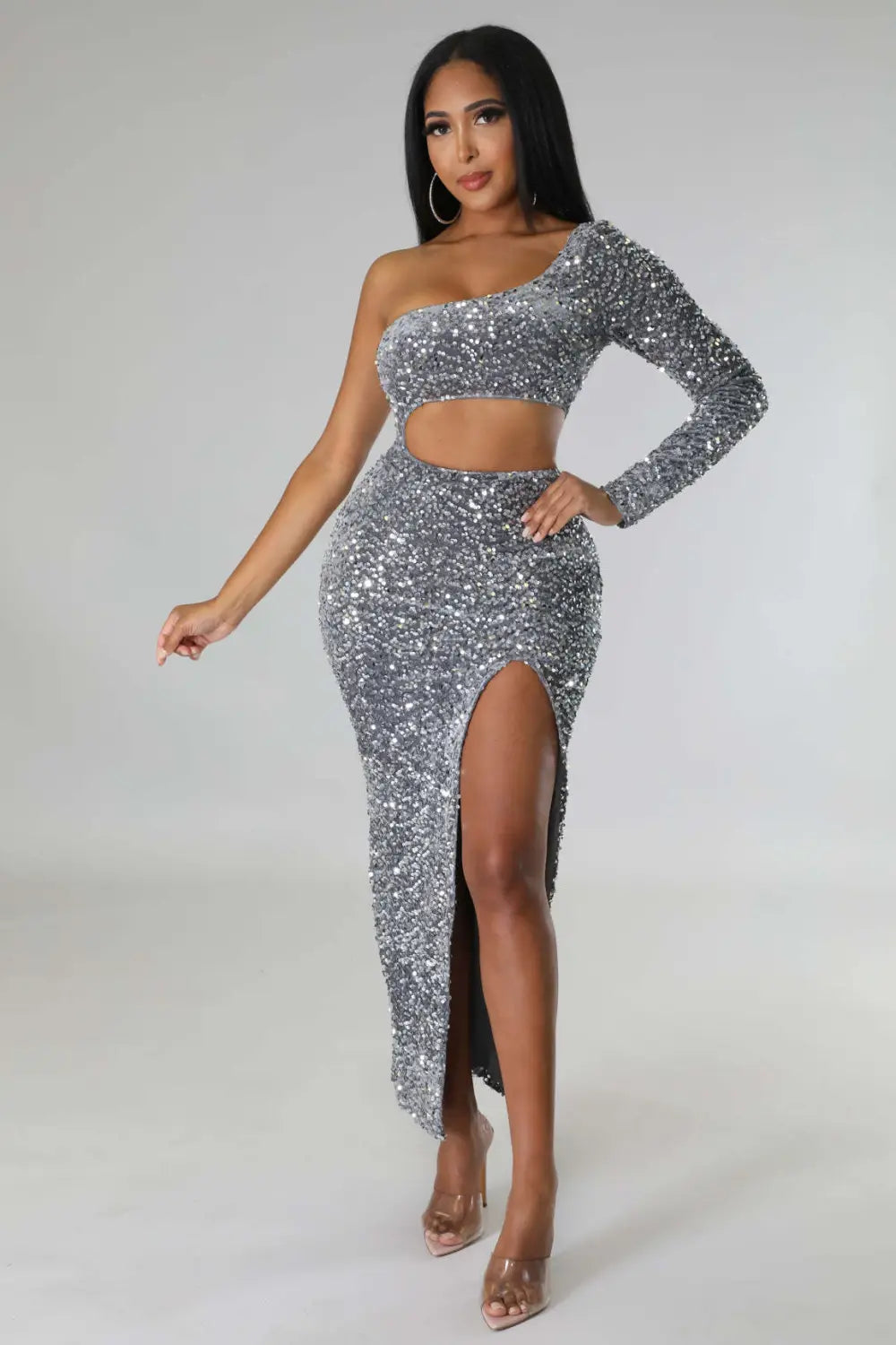 a shimmering silver sequined one-shoulder crop top and matching high-slit skirt set featuring fashionable sequins sexy design with a sexy navel split detail