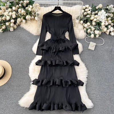 Black long-sleeved tiered dress with ruffled layers and a fitted waist featuring heavy industry pleated design from the Olive Green Cake Heavy Industry Pleated Long Dress collection.