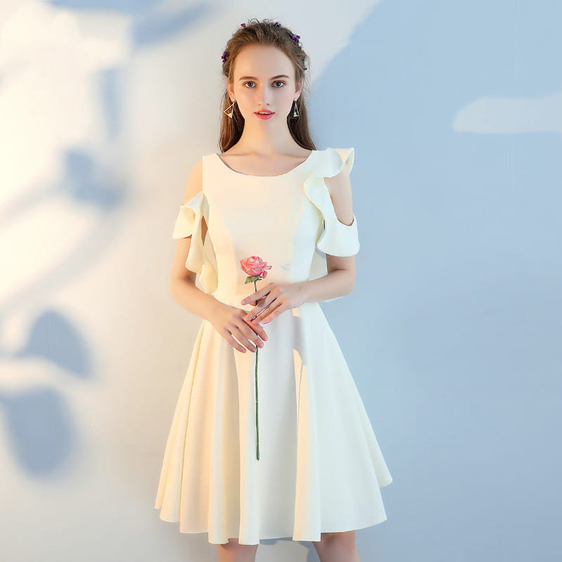 A soft ivory off-shoulder dress with delicate ruffled sleeves and a flared skirt made from main fabric composition by Pink Short Sisters.