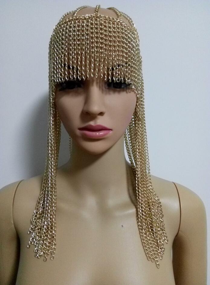 Gold chain metallic mesh dome pendant mask with intricate dangling chains as a pendant mask head accessory and mask head chain.