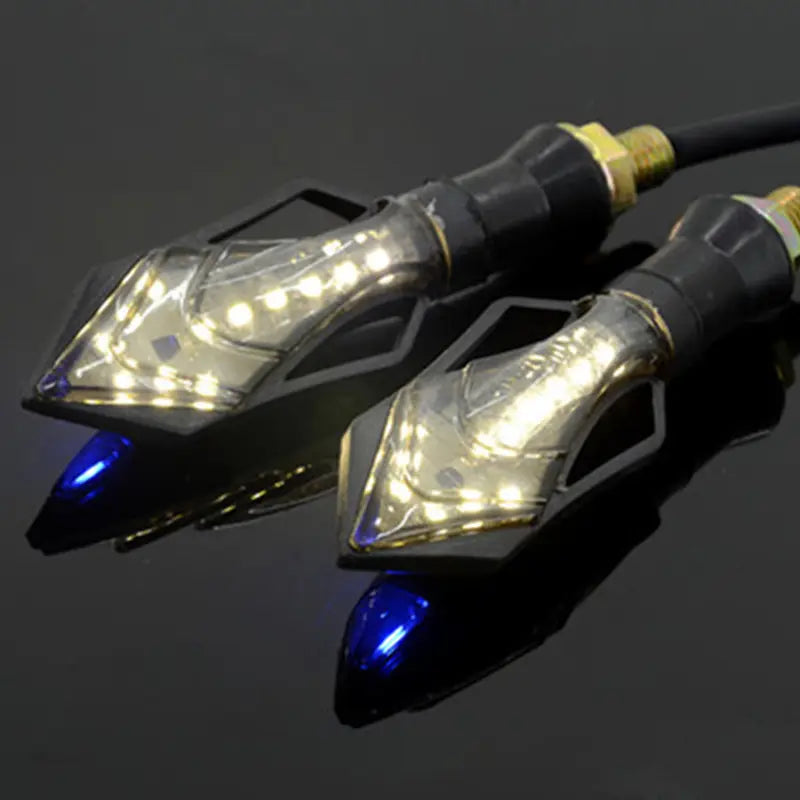 black and gold led motorcycle turn signals with clear angular housings featuring multiple bright white leds designed for motorcycle modification accessories