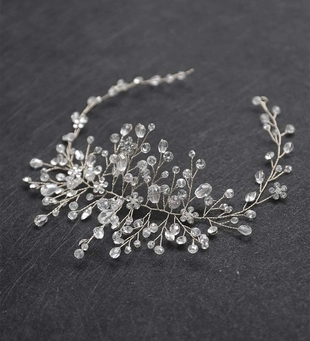 Silver wire hair accessory adorned with clear faceted crystals and tiny flower-like embellishments designed as elegant silver crystal gauze dress accessories headdress.