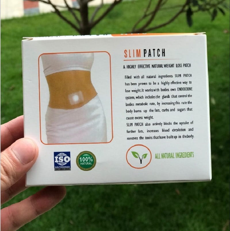 white cardboard box for magnetic slimming navel belly button patch showing beige adhesive belly button patch applied to a person’s waist