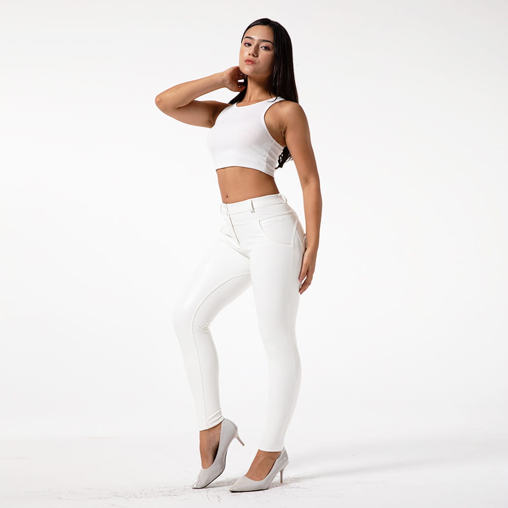 white pu leather high waisted skinny pants featuring a sleek form fitting design ideal as leather fitness pants by royale essence lux