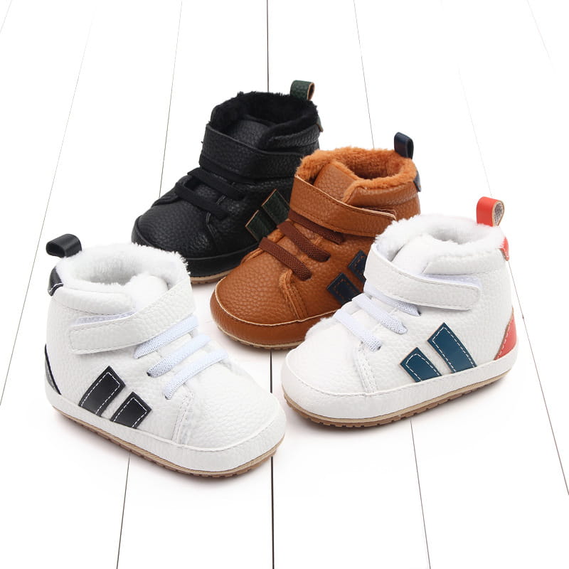 plush lined sports soft-sole cotton baby shoes in white brown and black featuring velcro straps and a plush lining for comfort.