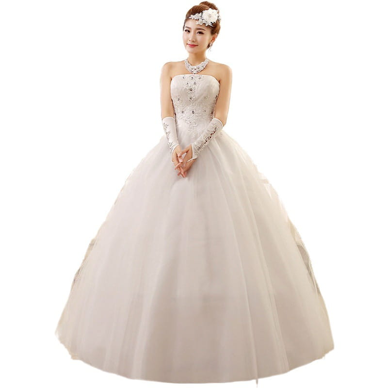 a korean style tube white wedding dress featuring intricate beading and lace detailing on the strapless bodice paired with matching long gloves