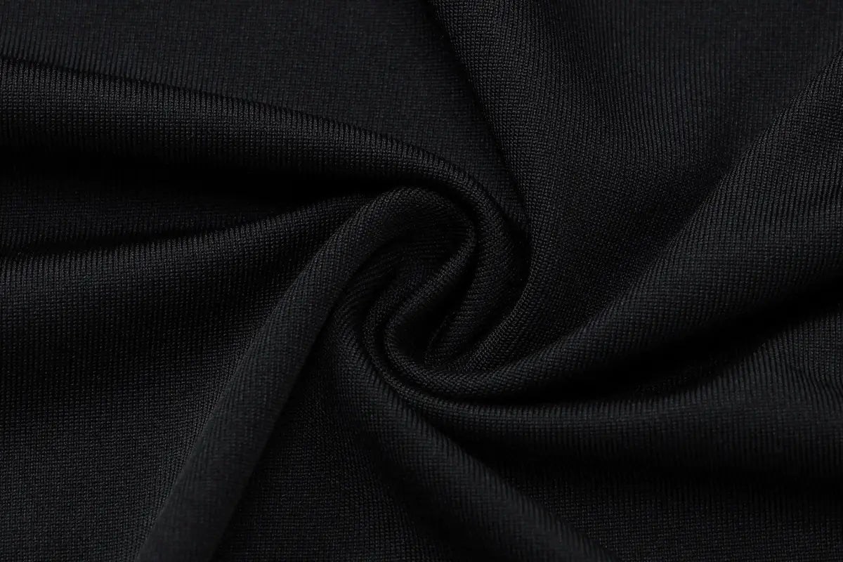 black ribbed knit fabric with a smooth stretchy texture featured in a sexy hot girl long sleeve dress designed for a sexy hot look