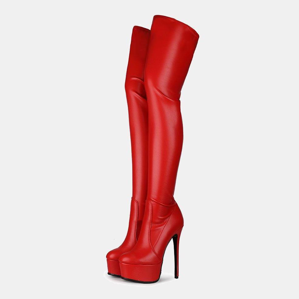 Vibrant red glossy leather knee high heel boots with platform heel and stiletto ankle support in pink patent platform high heel boots.