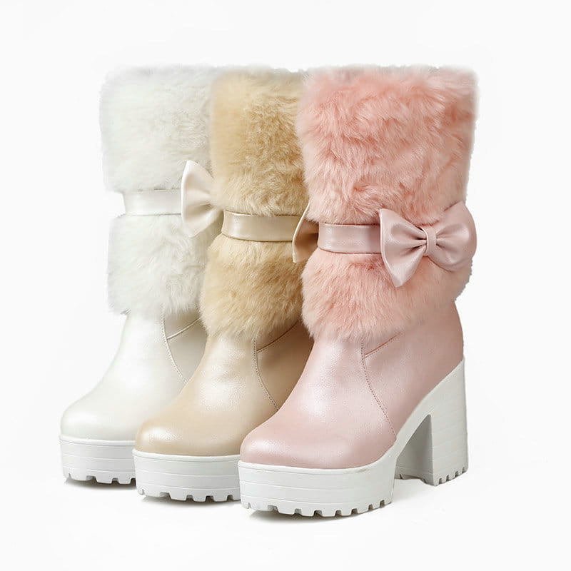 white platform sweet bow boots are pink faux fur knee-high boots featuring a satin bow and chunky white heel snow sweet platform.