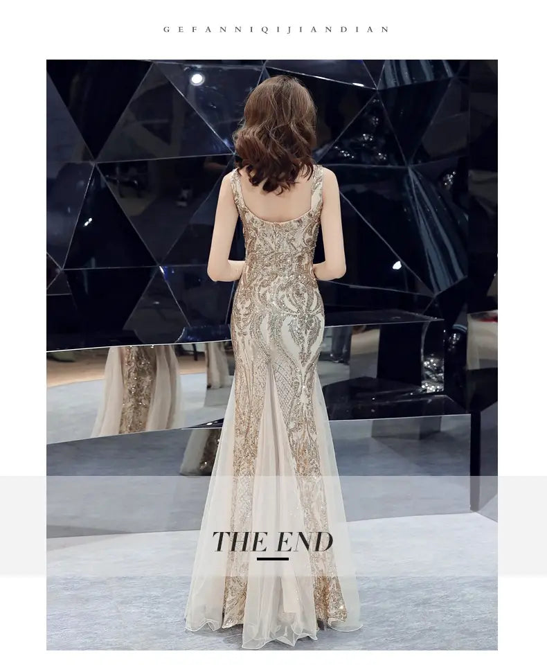 A shimmering gold and cream fishtail long summer gown featuring intricate beaded detailing on the bodice and skirt crafted from sheer overlay fabric ideal for evening wear.