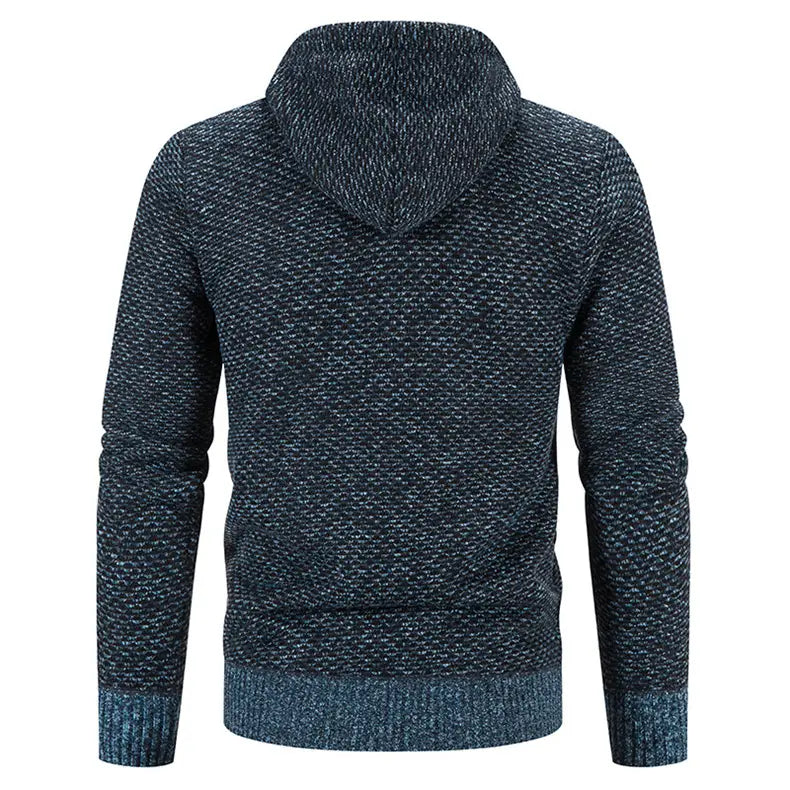 Dark blue marled knit hoodie with a textured speckled pattern and ribbed cuffs featured in a gray thicken winter coat with zipper closure solid for cold weather.