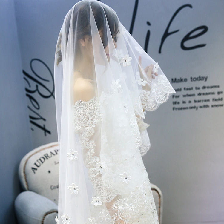 a delicate white korean lace petal bridal veil adorned with embroidered floral appliqués and subtle beading ideal for wedding style veil korean