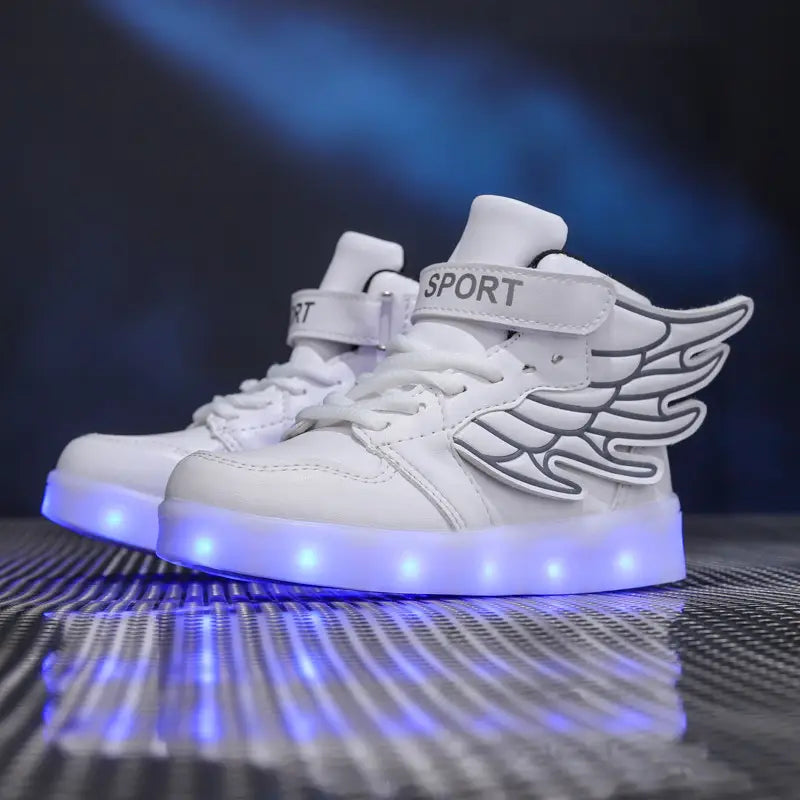 White high-top light shoes children with winged side decals and glowing blue led usb charging light soles.